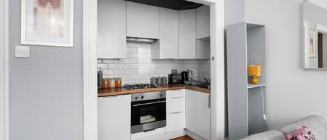 Fridge, microwave, coffee/tea maker, electric kettle