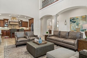 TV, fireplace - Grand Oasis | Theater Room | Near Attractions | Reunion Membership (Kissimmee)