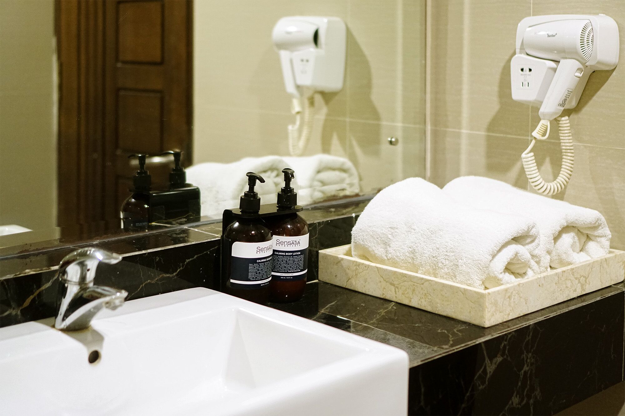 Shower, designer toiletries, bidet, towels