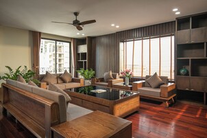 Presidential Studio Suite, Ocean View | Living area | 50-inch Smart TV with digital channels
