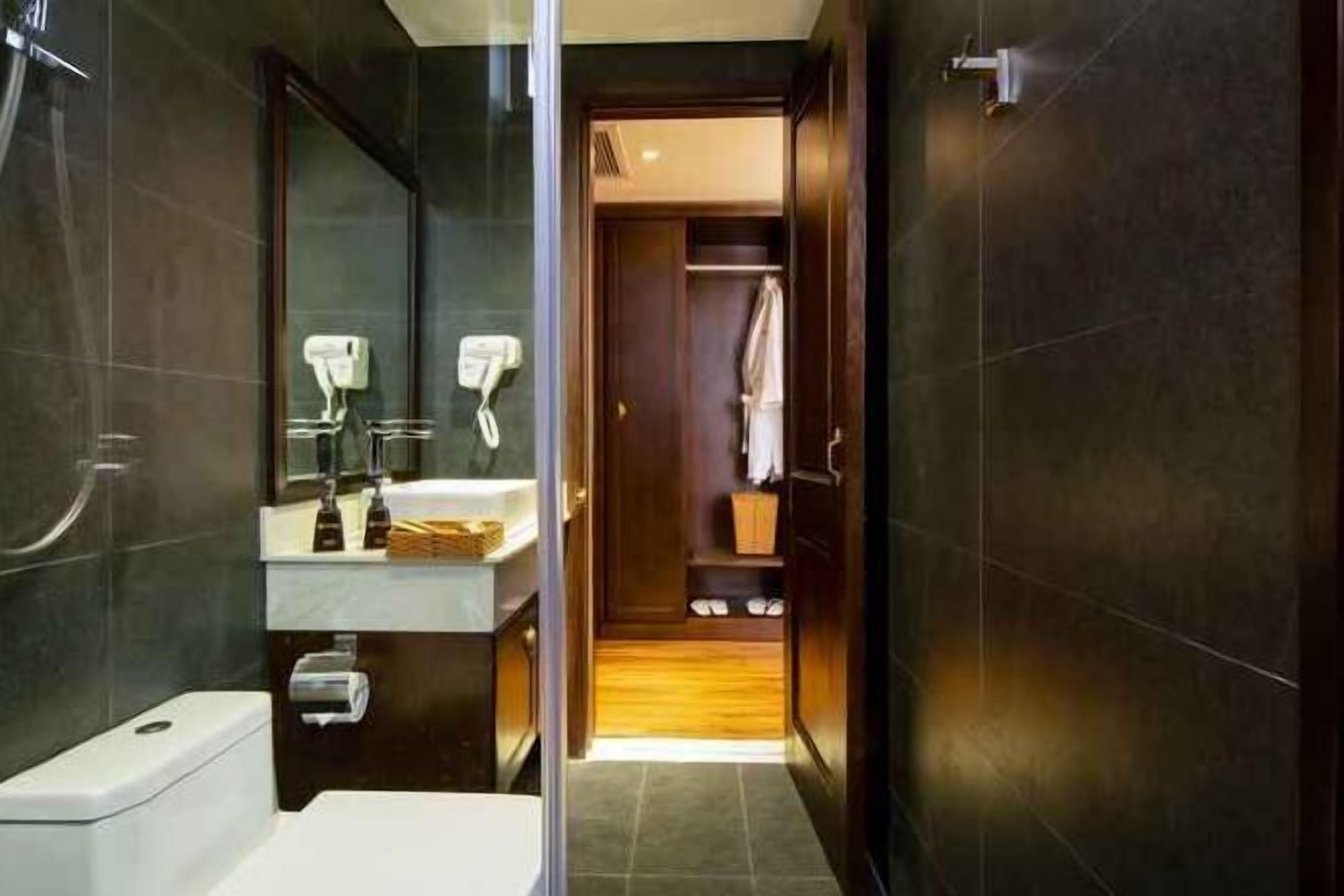 Designer toiletries, hair dryer, bathrobes, slippers