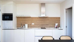 Microwave, stovetop, dishwasher, cookware/dishes/utensils