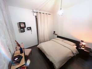 2 slaapkamers, een strijkplank/strijkijzer, gratis wifi, beddengoed