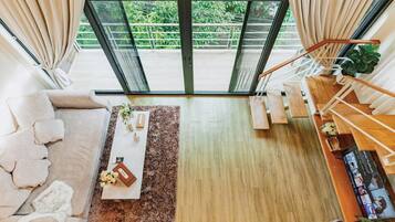 Exclusive Cottage | Living area | 40-inch LCD TV with digital channels, Netflix, streaming services