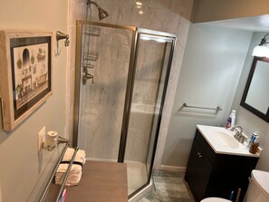 Shower, eco-friendly toiletries, hair dryer, bidet