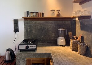 Fridge, stovetop, electric kettle, cookware/dishes/utensils