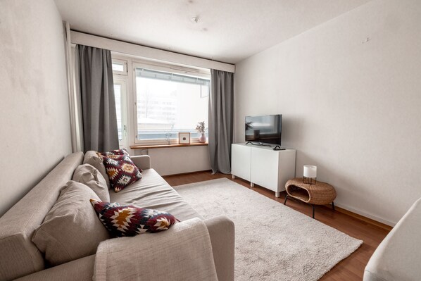 Appartement Confort | Coin séjour | Télévision