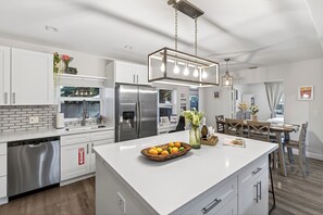 Fridge, microwave, oven, stovetop - Hot Tub, Firepit, Deck | 10mins to Beach | Middle Terrace Cottage by AvantStay (Fort Lauderdale)