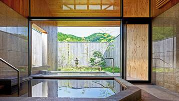 Separate bathtub and shower, free toiletries, hair dryer, bathrobes