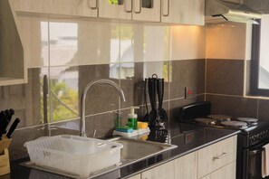 Appartement Deluxe, 1 trÚs grand lit | Cuisine privée