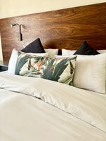 Deluxe Room | Hypo-allergenic bedding, down comforters, in-room safe