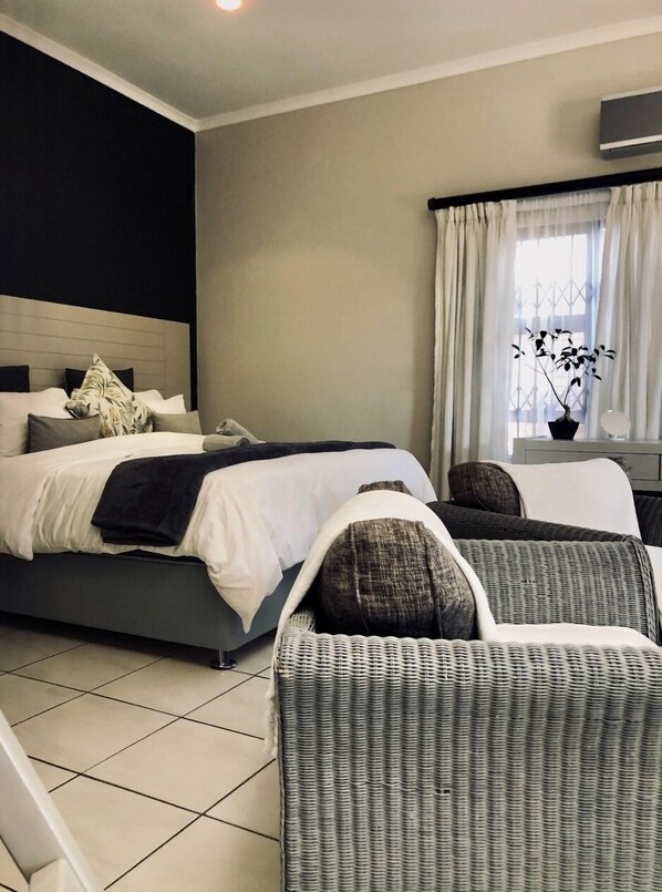 Family Studio Suite, 1 Bedroom | Hypo-allergenic bedding, down comforters, in-room safe - Koi Liv-Inn (Germiston)