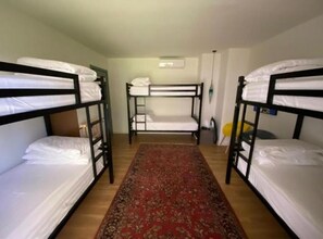 Dormitório compartilhado família | 1 quarto