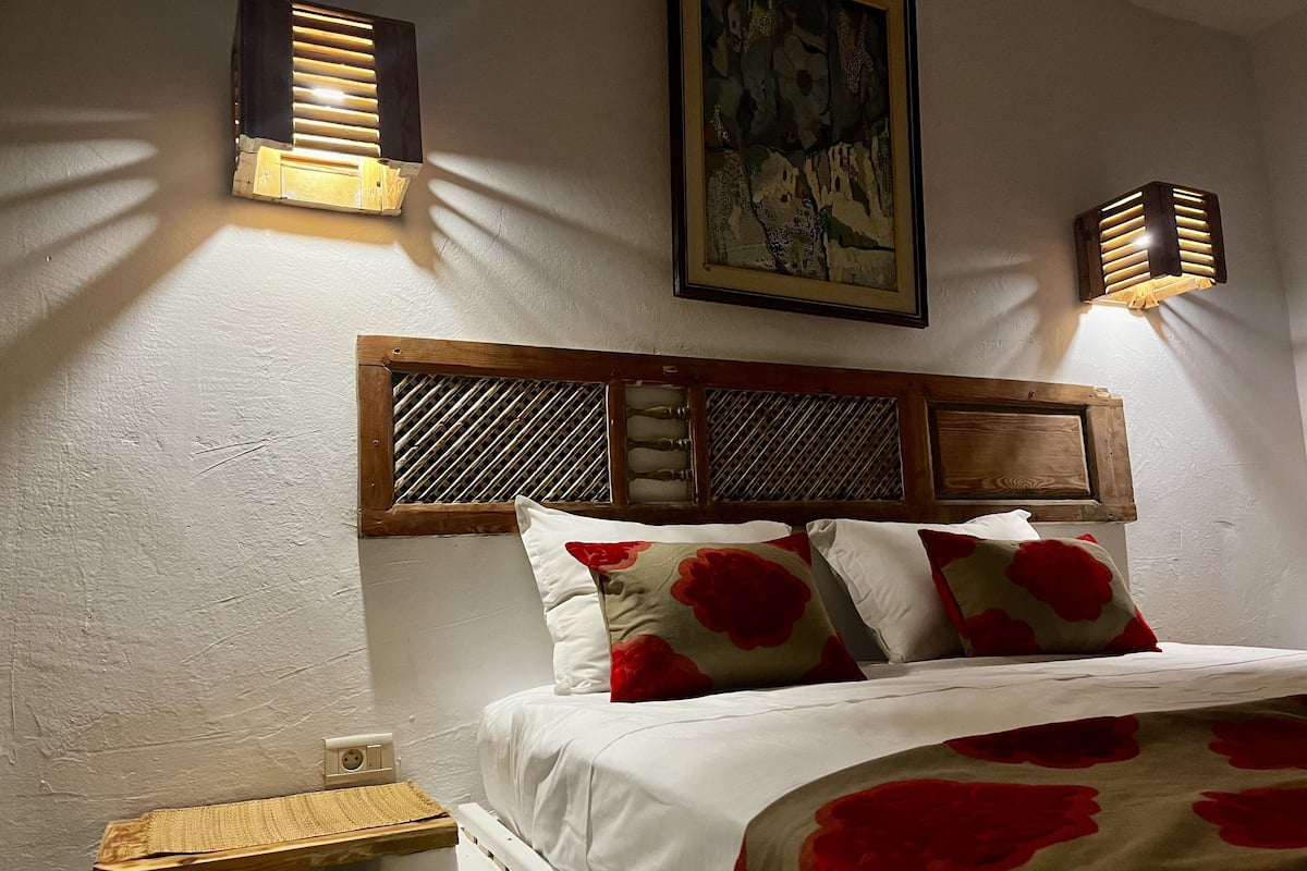 Suite Deluxe | 1 camera, minibar, con stile personalizzato, tende oscuranti