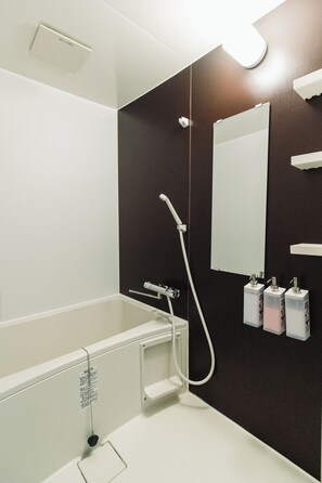 Hair dryer, towels, soap, shampoo
