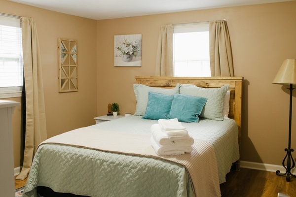 Retreat to our cozy haven, complete with a luxurious queen bed fit for restful nights and sweet dreams