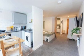 A compact apartment with a kitchenette, a dining area, a bedroom, and a bathroom. - £ - City Centre - Duke Street Studio ~ 5* Location (Liverpool)