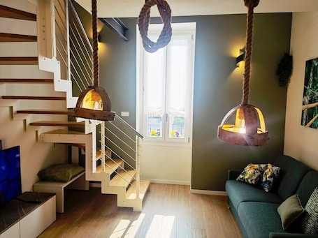 Living area. One Bedroom Apartment