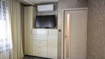 2 habitaciones, tabla de planchar con plancha, wifi y ropa de cama