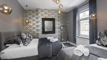 3 bedrooms, iron/ironing board, travel cot, WiFi