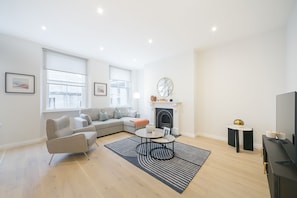 Superior Apartment, 1 Bedroom | Living area | Flat-screen TV