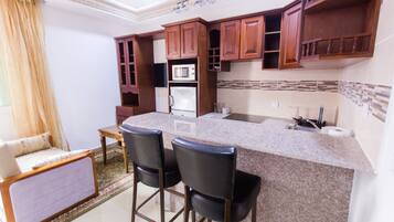 Business Apartment, Non Smoking, Pool Access | Living area | Flat-screen TV