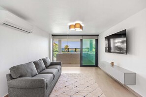 TV, offices - Salty Villa | Modern Beachfront Oasis (Arecibo)