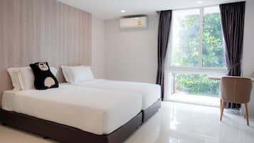 Desk, laptop workspace, free WiFi, bed sheets