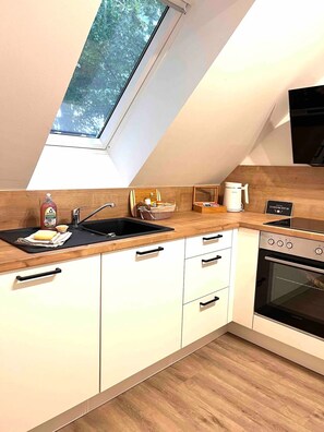 Refrigerador, horno, parrilla de estufa y lavavajillas 