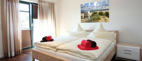 2 slaapkamers, een strijkplank/strijkijzer, reisbedje, gratis wifi