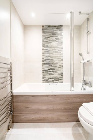 Hair dryer, towels, soap, shampoo