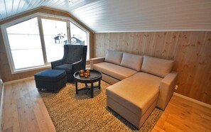 Family Cabin | Living area | 42-inch LED TV with digital channels, streaming services