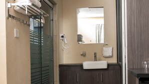Deluxe Studio Suite | Bathroom | Slippers, towels - Charchoma Accommodation- Wells Villa (Mombasa)