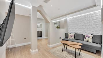 Basement One Bedroom | Living area
