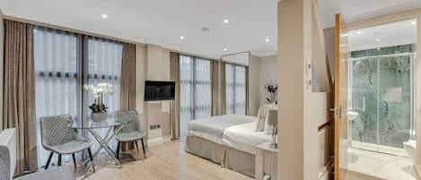 Deluxe Studio | 1 bedroom, in-room safe, iron/ironing board, free cribs/infant beds