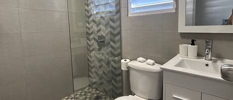 Hair dryer, towels, soap, shampoo
