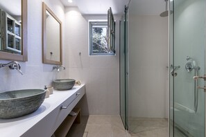 Shower, hair dryer, towels, soap