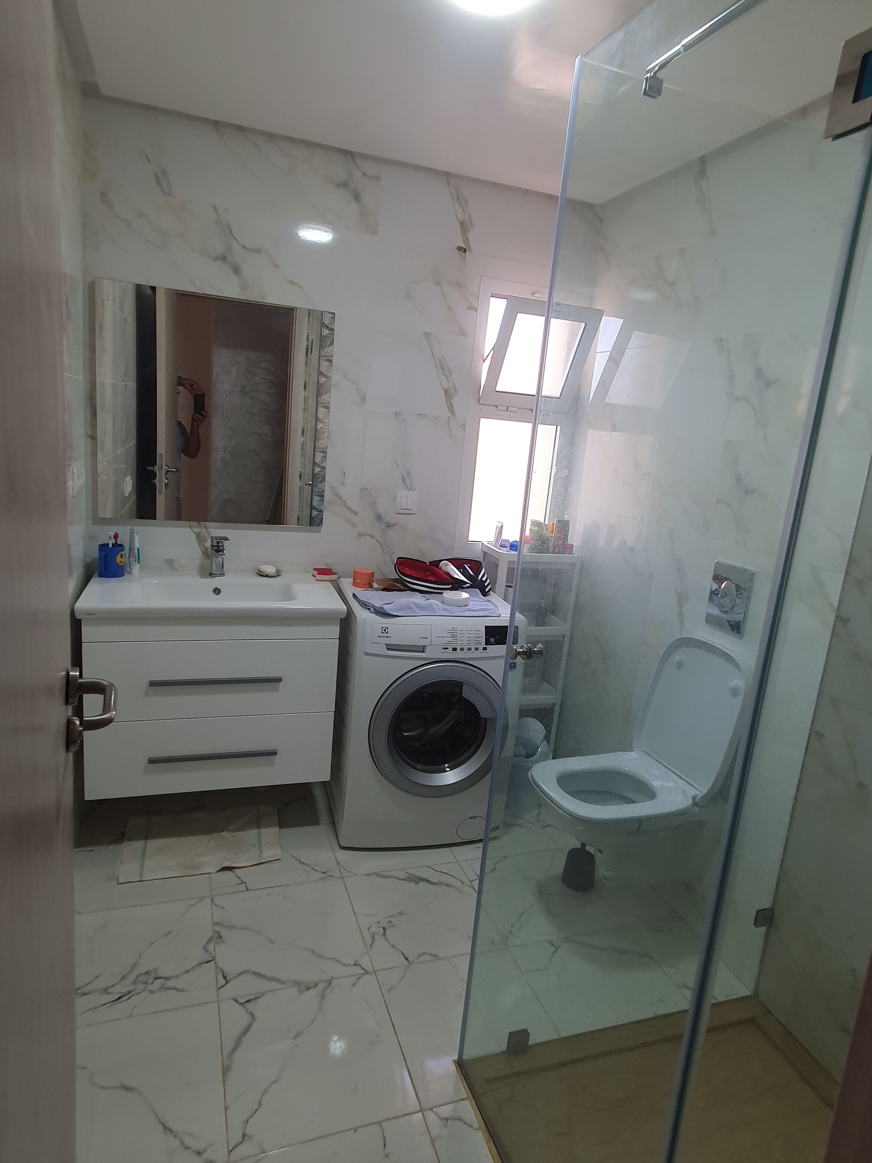 Shower, towels, soap, shampoo