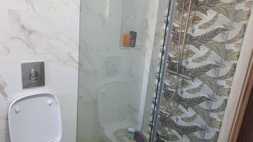 Shower, towels, soap, shampoo