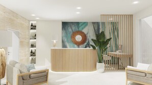 Un área de recepción moderna con un mostrador de madera, un cuadro abstracto grande y una planta en maceta.