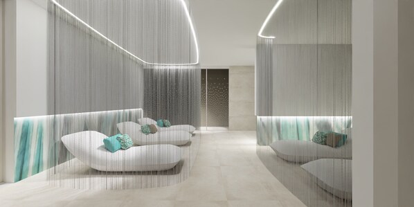 A modern interior with a central seating area, a patterned wall, and a light fixture. - Margaida Boutique Hotel & SPA (Dorgali)