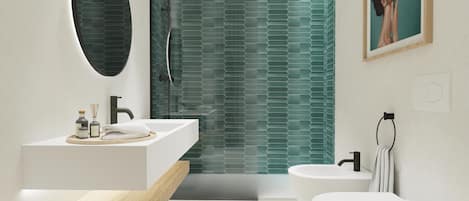 A modern bathroom with a white vanity, a freestanding bathtub, and a glass shower enclosure.