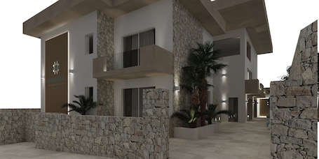 Fachada de la propiedad por la tarde o noche. Margaida Boutique Hotel & SPA
