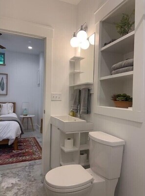 Shower, eco-friendly toiletries, hair dryer, towels
