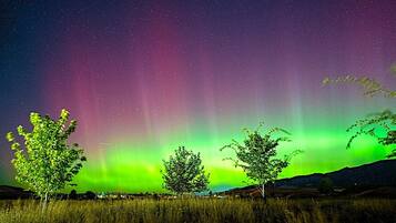 A night sky with the aurora borealis.
