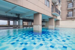 Outdoor pool - OYO 93586 Apartemen Tamansari Panoramic By Narel Ii (Bandung)