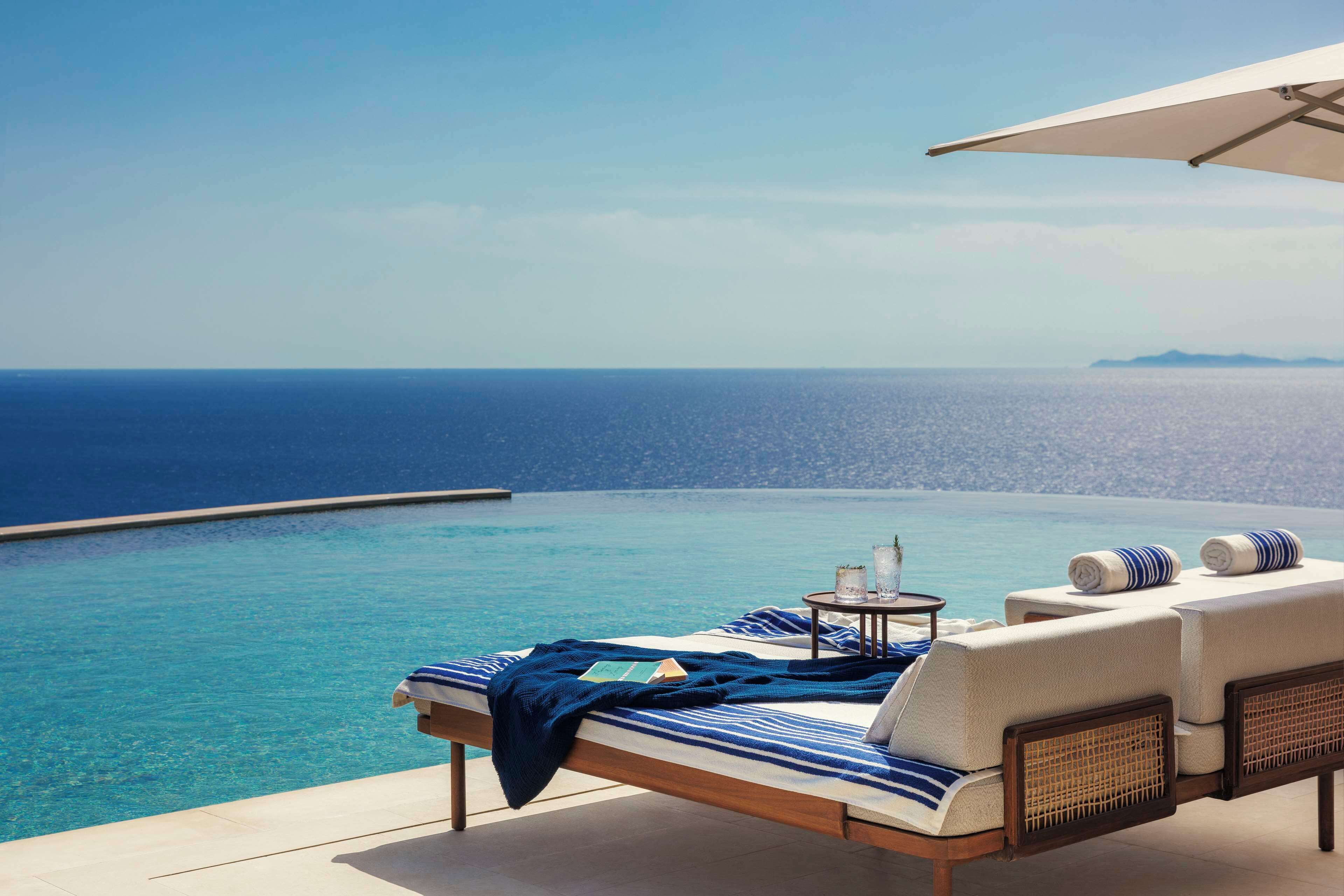 Indoor pool, 3 outdoor pools, open 11:00 AM to 7:00 PM, pool umbrellas