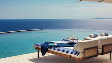Indoor pool, 3 outdoor pools, open 11:00 AM to 7:00 PM, pool umbrellas