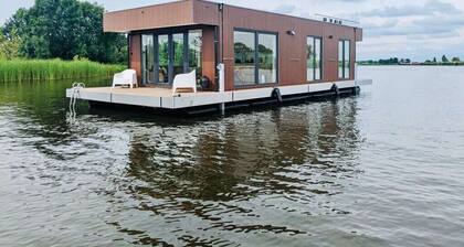 Houseboat: "De Walvis" with tender. 6p 4+ 2 kids