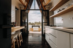 Panoramic Cabin | Living area | Flat-screen TV